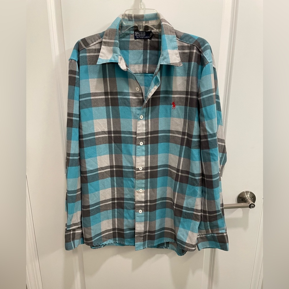 Polo By Ralph Lauren. Looks like Flannel but it’s 35% cotton, 65% Polyester